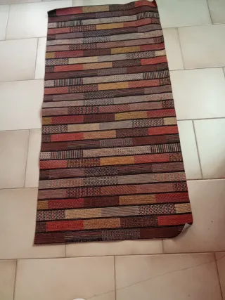 Tappeto tessuto fantasia geometrica