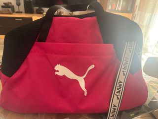 Mochila deportiva Puma rosa y negra