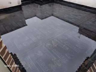 Tela asfáltica, oficial