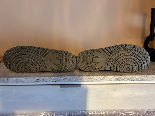 Botas de pelo beige/gris con plataforma