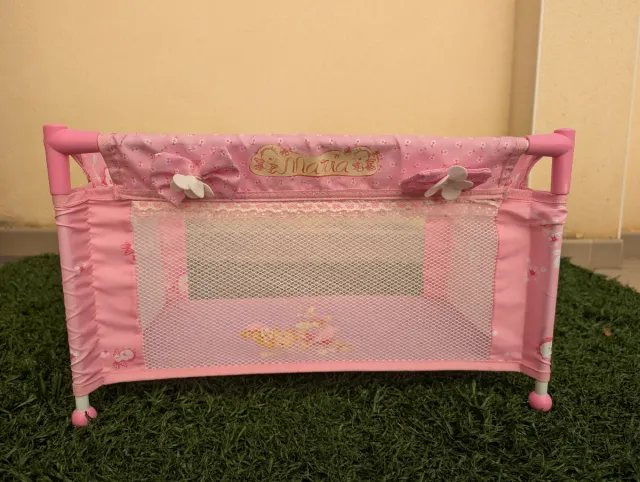 Culla da viaggio rosa per bambole