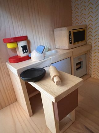 Casa de muñecas de madera