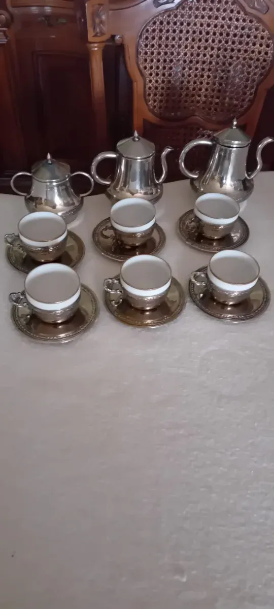 Set caffè in argento e porcellana