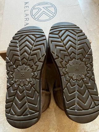 Botas planas de piel niña