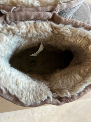 Botas planas de piel niña