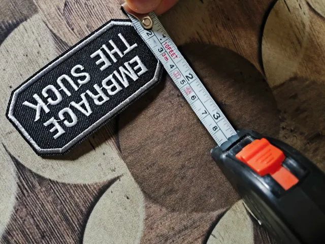 Toppa termoadesiva Embrace the Suck