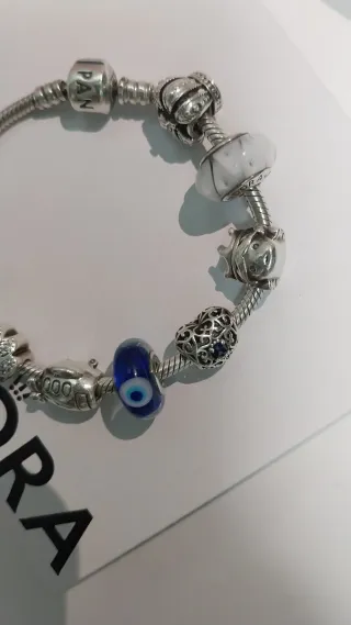 Pulsera Pandora con 9 charms Pandora. Talla 18,5