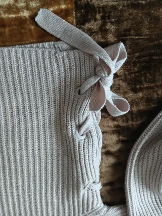 Jersey de punto holgado con lazadas