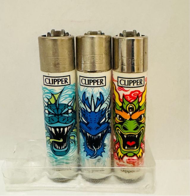 Lote 33 Mecheros Clipper vários designs