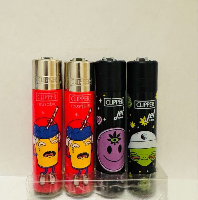 Lote 33 Mecheros Clipper vários designs