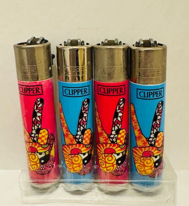 Lote 33 Mecheros Clipper vários designs