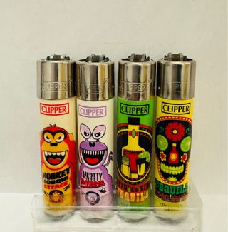 Lotto 33 accendini Clipper vari design