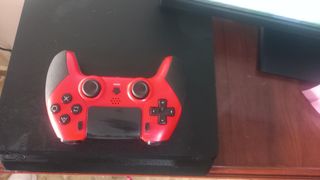 PS4 Slim Sony + Mando DualShock Rojo