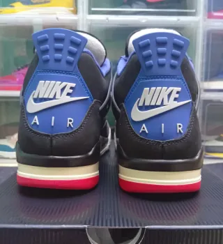 Jordan 4 Rare Air Negro Rojo