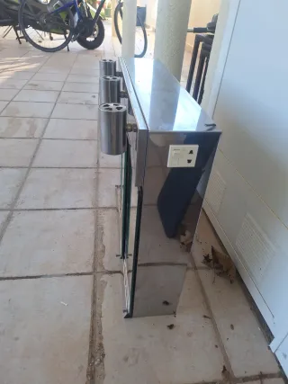 Armario espejo inoxidable con luz y enchufe latera