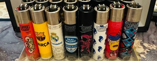 Lote de 48 isqueiros Clipper variados