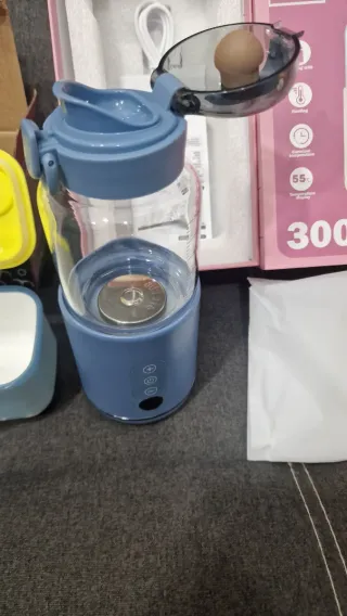 Calienta biberones portátil 300ml+caja almacenaje