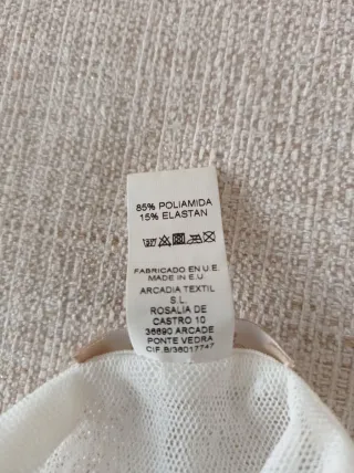 Top lencero rosa y blanco con encaje