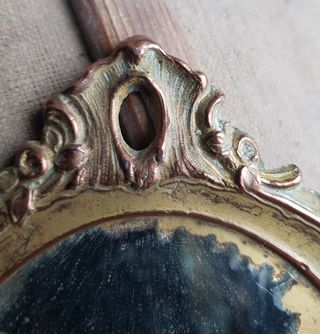 Antiguo espejo de mano o tocador