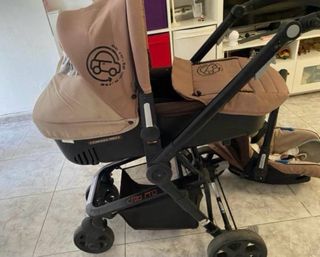 Carrito de bebé y silla de coche marrón