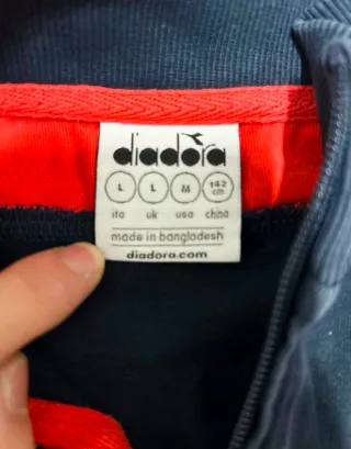 Tuta Diadora nera e rossa