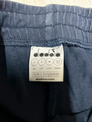 Tuta Diadora nera e rossa