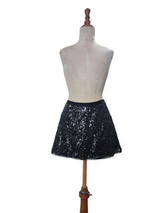 Kookaï/ Minifalda de lentejuelas negra talla 1-S.