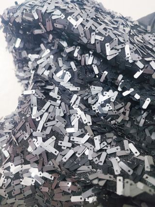 Kookaï/ Minifalda de lentejuelas negra talla 1-S.