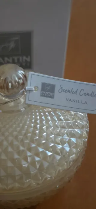 Candela profumata in vetro dorato