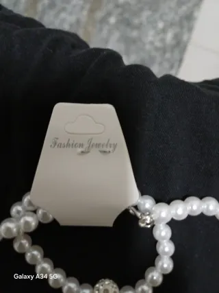 Set collana, bracciale e orecchini perle