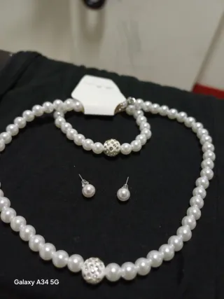 Set collana, bracciale e orecchini perle