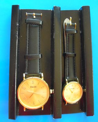 Set 2 Relojes Eiger Hombre y Mujer Dorado