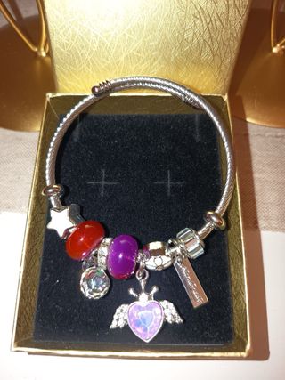 Pulsera Pandora con charms de disney,ositos...