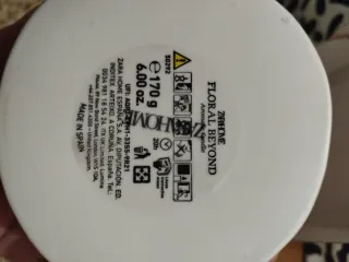 Candela aromatica Zara Home in ceramica pietra beige