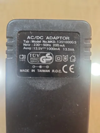 Adaptador AC/DC 13.5V 1000mA mechero coche