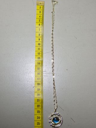 Bisutería: Collar con diseño estrellas y planeta.