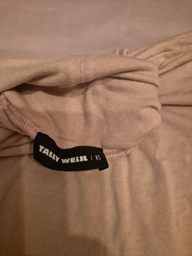 Sottogiacca beige con stampa