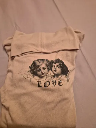 Sottogiacca beige con stampa