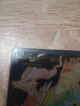 Carta Pokémon Reshiram & Charizard GX