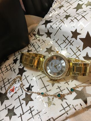 Reloj unisex dorado con pedrería Fiesta