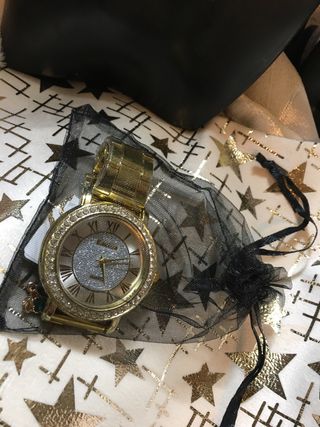 Reloj unisex dorado con pedrería Fiesta