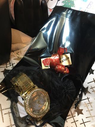 Reloj unisex dorado con pedrería Fiesta