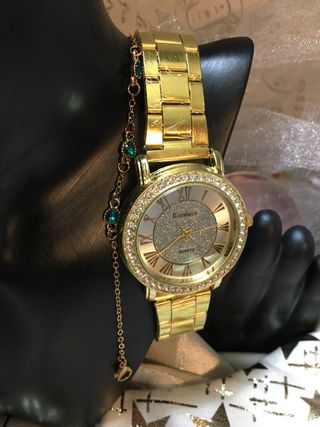 Reloj unisex dorado con pedrería Fiesta