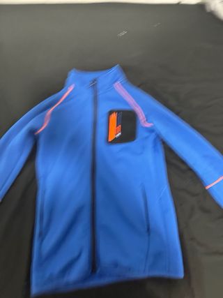 Chaqueta cortavientos azul para nieve