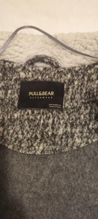 Due cappotti grigi e blu con cappuccio in regalo