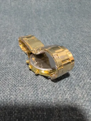 Reloj de mujer dorado sin estrenar