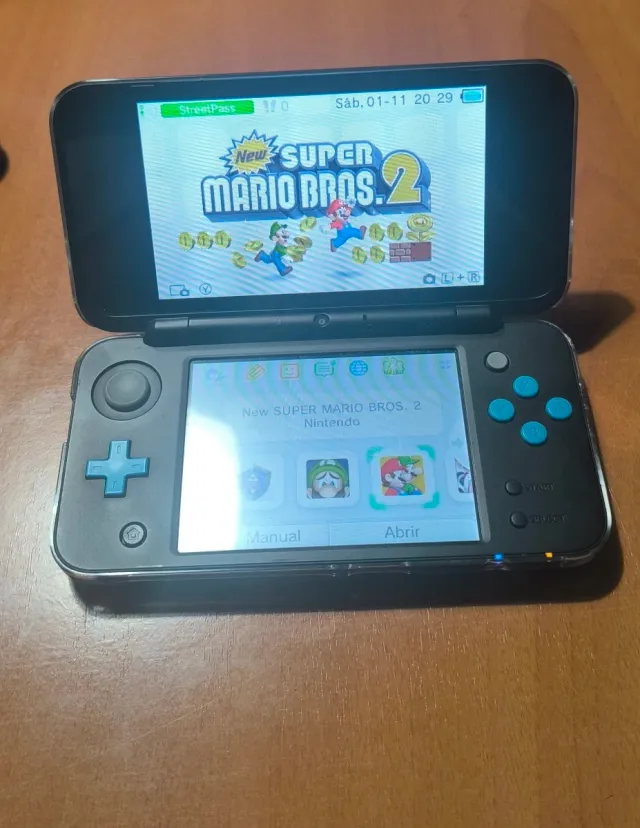 Nuovo Nintendo 2DS XL con giochi e scatola