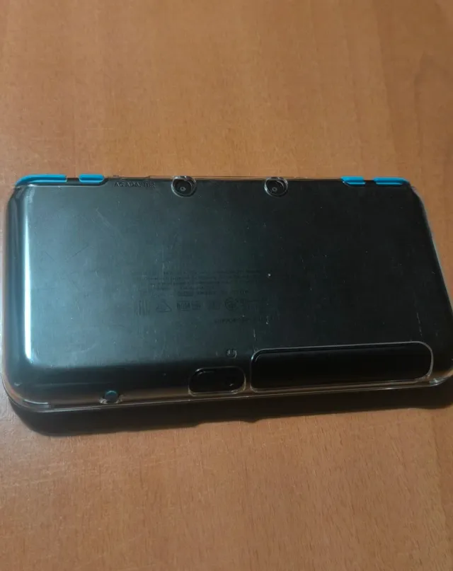 Nuovo Nintendo 2DS XL con giochi e scatola