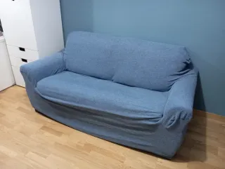 Sofá cama 2 plazas verde y gris.