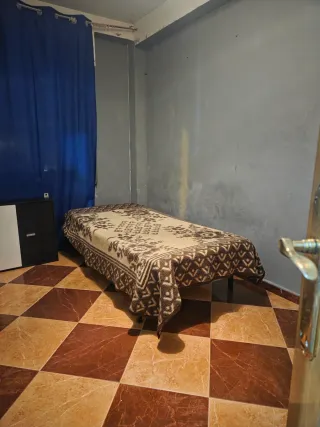 Habitación amueblada